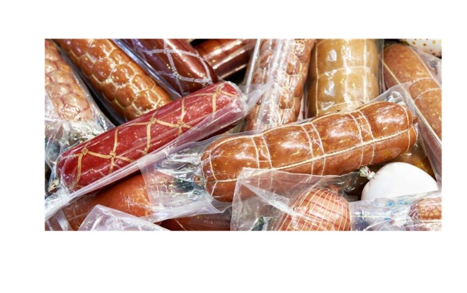 Pile of sausages in plastic vacuum packs